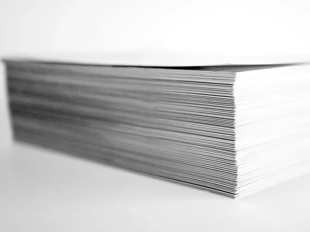 Stack of printed papers representing a CV backlog