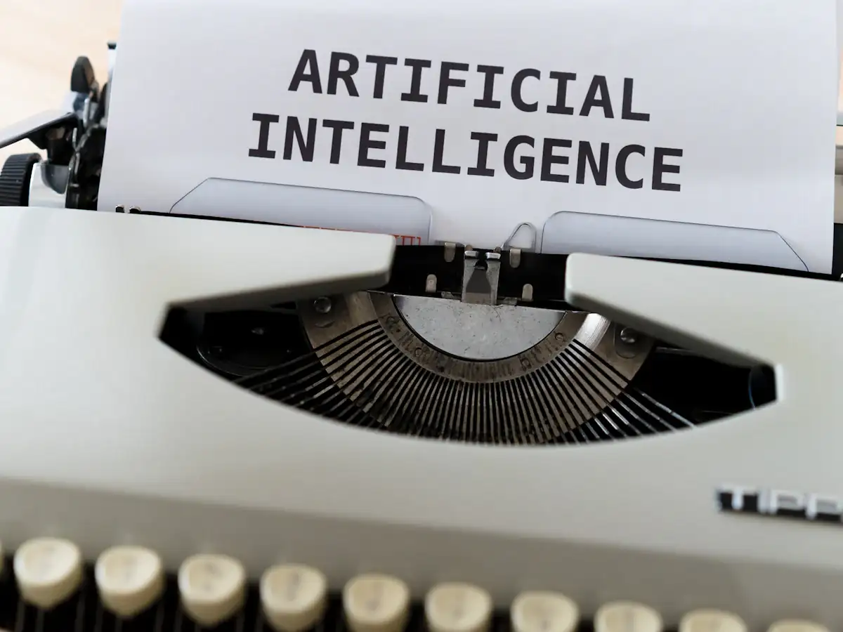 Typewriter with a page reading Artificial Intelligence